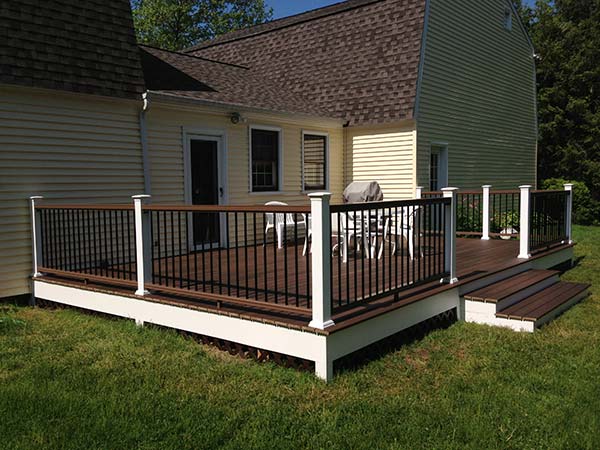 Brown Fiberon deck on the back of a house